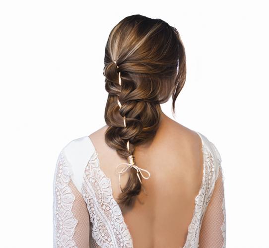 Messy braid with decorative cord
